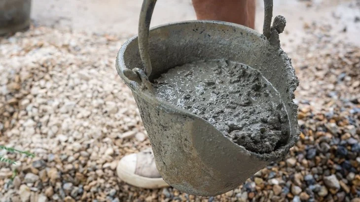 Bucket of wet concrete