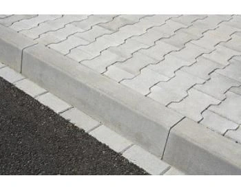 Concrete curb and paving stones