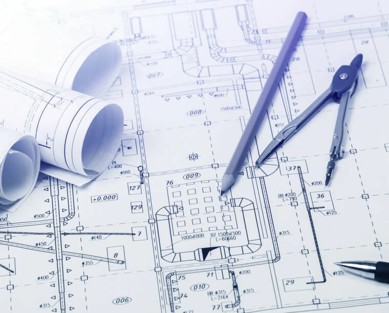 Architektonické plány s nástroji pro výpočet spotřeby cihel.