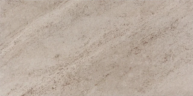 Textura keramického obkladu na stěnu s jemným vzorem.