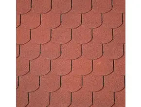 Detail červených střechových šindele s tmavými spárami.
