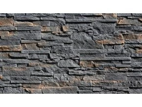 Detailní pohled na tmavě šedý umělý kamenný obklad s přírodní texturou.
