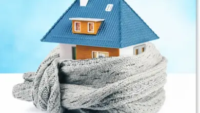 Dům v šálu jako metafora tepelné izolace budov.