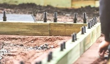 Concrete foundation with anchor bolts