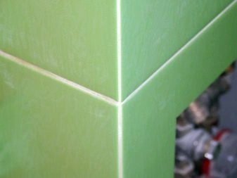 Green ceramic tiles corner joint