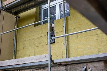 Insulation installation on wall