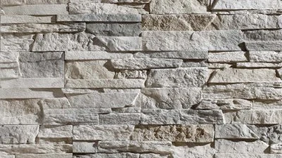 Textura kamenného obložení pro fasádu nebo studnu.